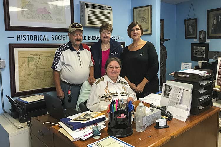 Left to right: Vern Recker, Lou Goodwin, Connie Ewazen (seated), Jill Riegelmayer-Kolodny