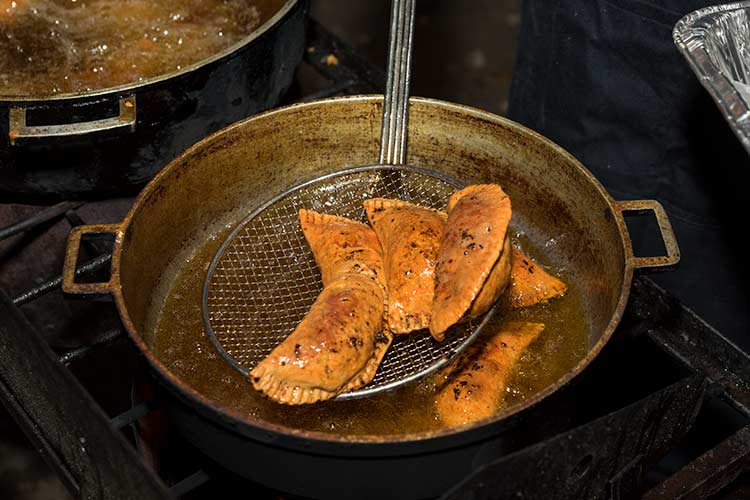 Cookin up empanadas/pastelillos (fried meat turnovers)  at Ingenuity Fest