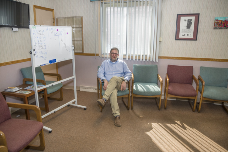 <span class="content-image-text">Drew Reimer in the group session room at Caritas Treatment and Wellness Center</span>