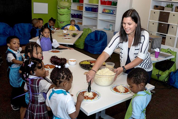 <span class="content-image-text">Susan Blasko facilitates a Kids in the Kitchen session.</span>