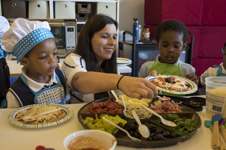 Susan Blasko serves up samples during a Kids in the Kitchen session.