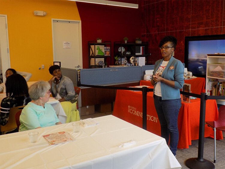 <span class="content-image-text">Tiffani Sutton leads a Kitchen To Go session.</span>