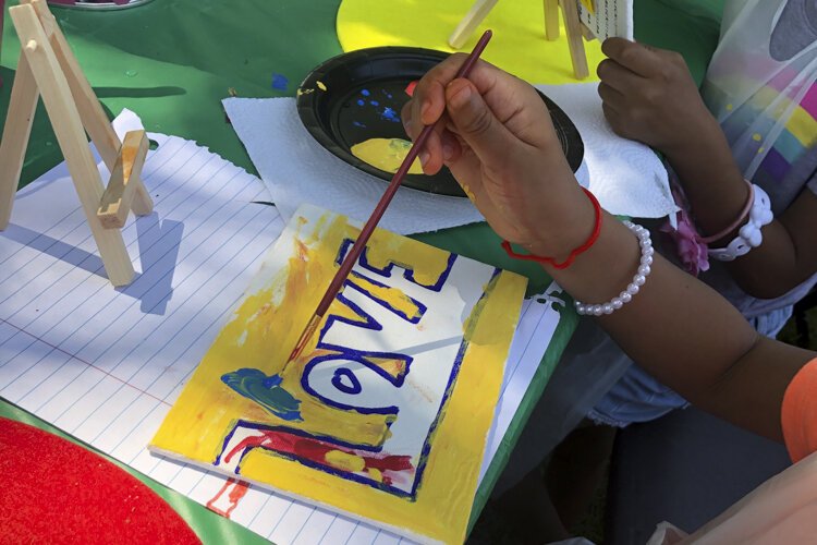 Painting in the Park drew several hundred people in July.