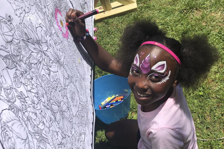 <span class="content-image-text">Painting in the Park gets creative on paper and on faces.</span>