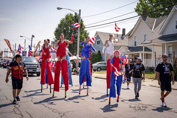 The Puerto Rican Parade and Festival hits the street.