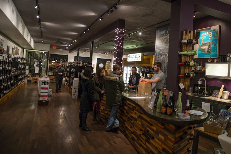 <span class="content-image-text">Kevin Goodman gets their company gift baskets at The Wine Spot in Cleveland Heights.</span>