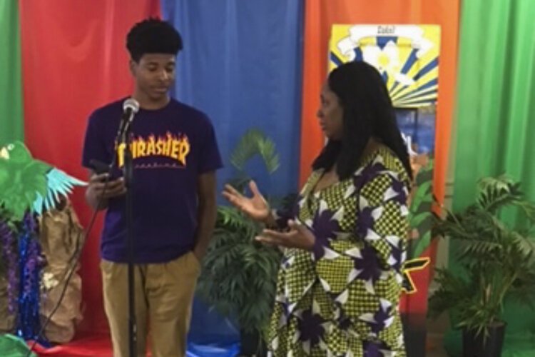 Chinetha Hall with Richard Clark, 16 years old of University School at Hasani