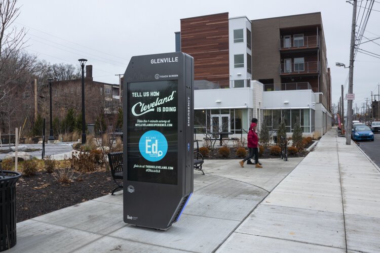 In a plaza at Glenville Circle North, a new, 8-foot-tall touchscreen kiosk offers visitor information.