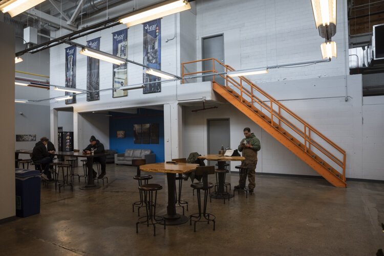 Krueger and his team decided to renovate offices that were very antiquated with drop ceilings and tiles into a more inviting space that honored the building’s rich history.