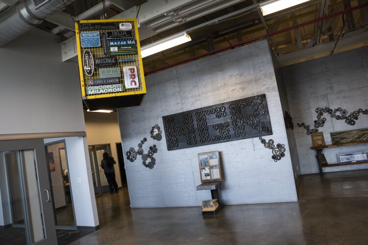 Krueger and his team decided to renovate offices that were very antiquated with drop ceilings and tiles into a more inviting space that honored the building’s rich history.