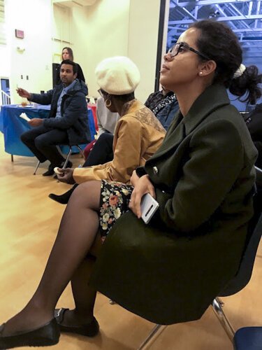 Dr. Luana Hearn of St. Vincent Charity Medical Center listens during a stop in Cleveland's Central neighborhood in November.