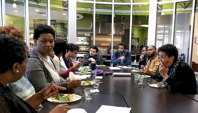 Conversation goes better over lunch during a reverse ride-along of Cleveland's Central neighborhood in November.