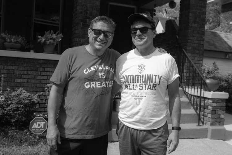 Todd Barr and Dane Vanatter in front of their home in Glenville