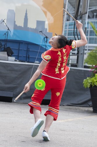Performers from the Cleveland Metroparks Zoo Asian Lantern Festival entertain the crowd