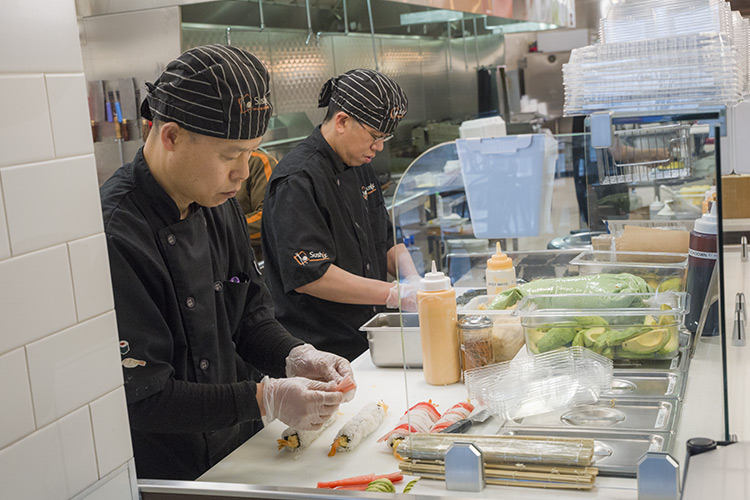 Preparing fresh sushi at Dave's