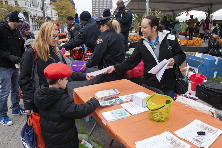 City of Cleveland Department of Public Health Case Manager Linda Provitt-Robinson distributes lead poisoning information at a recent event in Public Square.