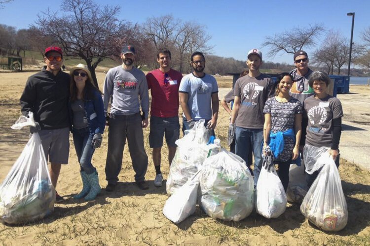 <span class="content-image-text">Drink Local. Drink Tap beach and lakefront volunteers at Perkins Beach.</span>