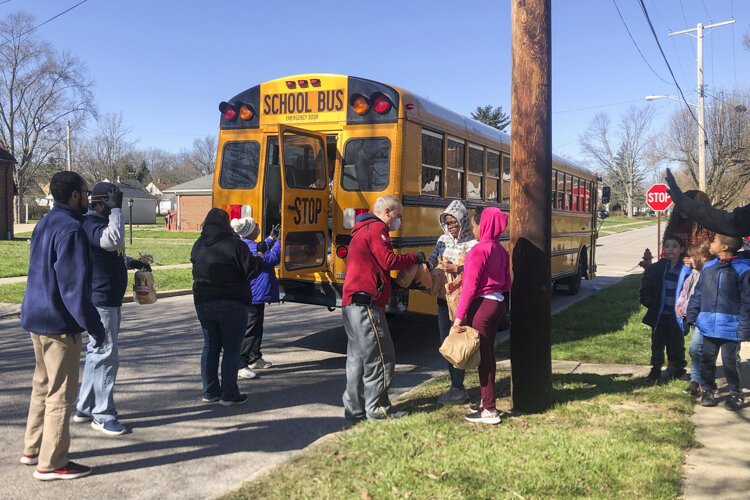 The Warrensville Heights School District has turned three school buses into food trucks distributing bags of breakfast and lunch every Monday, Wednesday and Friday.