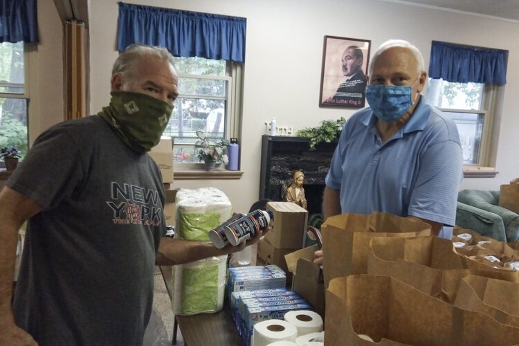 Bellaire-Puritas Development Corporation cleaning supply volunteers