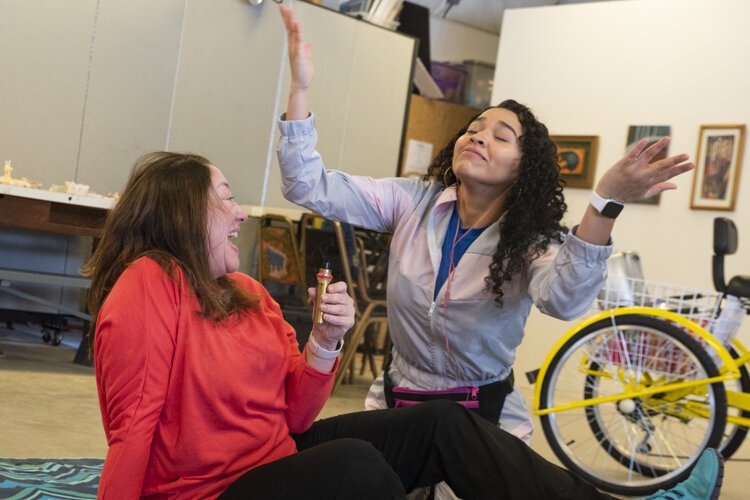 Monica Torres  and Jessenia Velez rehearse a scene from “Divorciadas, Evangelicas y Vegetarianas”.