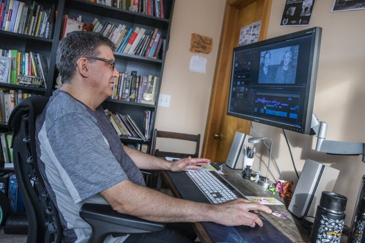 <span class="content-image-text">Brad Masi working on editing at his home in Cleveland Heights.</span>