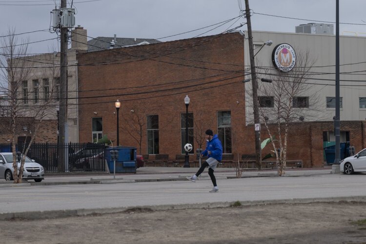 Empty parking lots like this one in Ohio City are ideal for a little solo soccer practice.