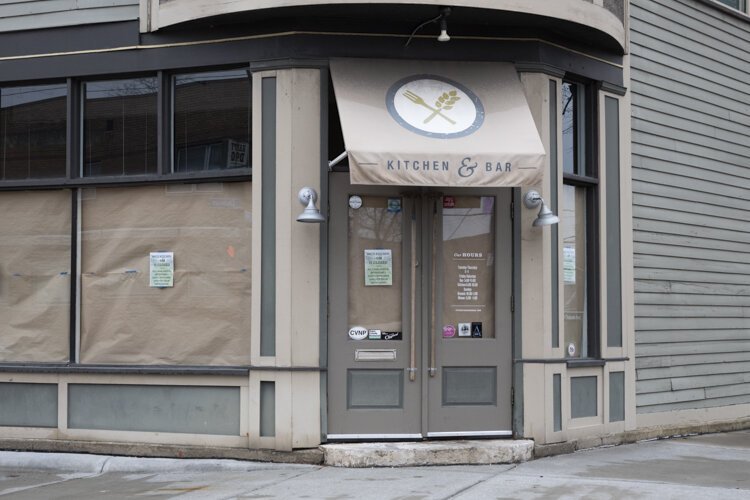 Sad sign of the times reads: Spice Kitchen + Bar is Closed. All cash, liquor, inventory and assets have been removed from the building.