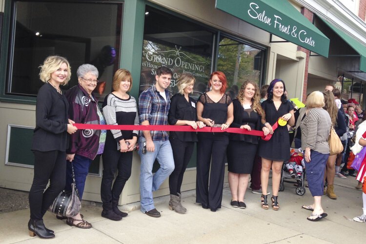 <span class="content-image-text">Abigail Brown (6th from left) of Front & Center Salon in Berea.</span>