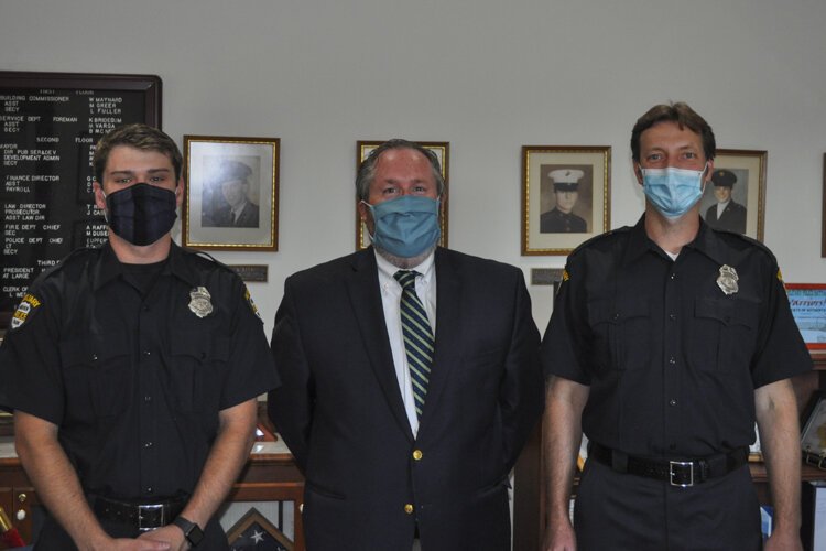 <span class="content-image-text">Fairview Park Mayor Patrick Cooney (center) with auxiliary police</span>