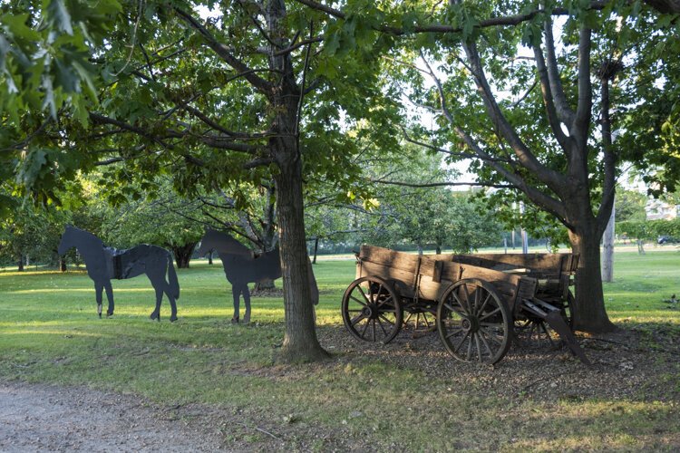 Dunham Tavern’s 900 ft. garden path features depictions of early settler life along with a stagecoach, log cabin, and community gardens.
