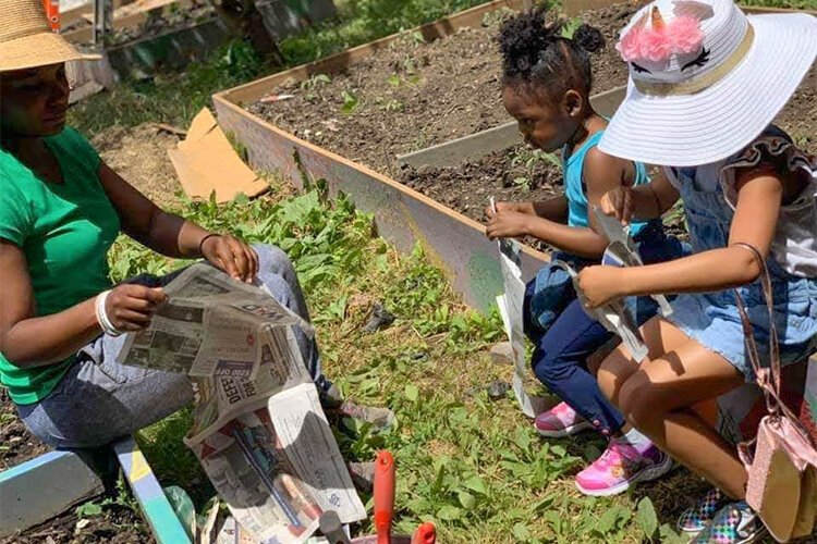 Christian Elder's Model Garden program draws on Elder's experience both as a youth educator as well as a lifelong gardener, and has raised approximately half of the money needed through the ioby website.