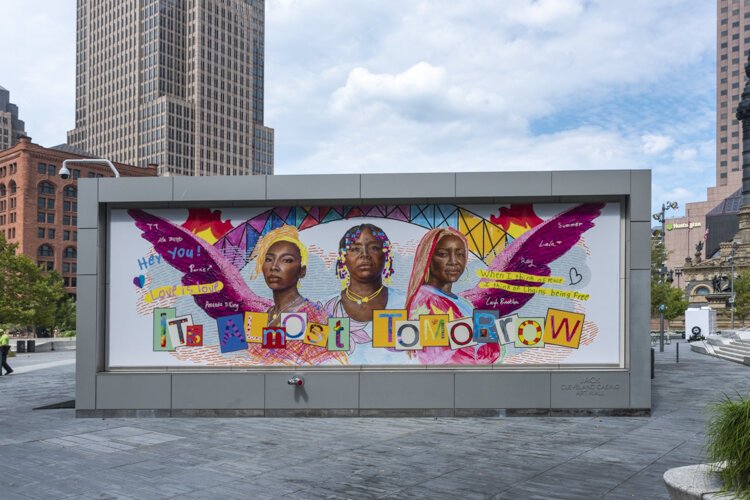 <span class="content-image-text">“It’s Almost Tomorrow” depicts the three founders of Black Lives Matter (BLM)—Alicia Garza, Patrisse Cullors, and Opal Tometi—and was installed on the side of the Public Square Café earlier this month.</span>