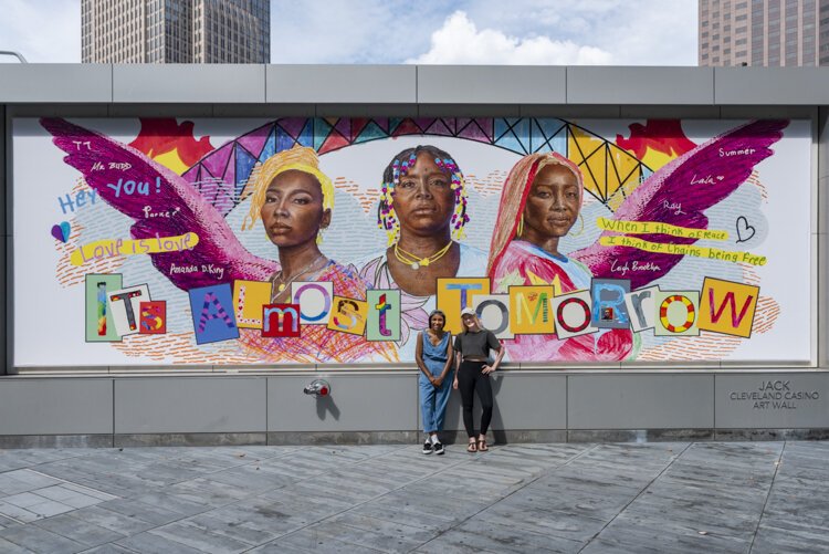 Amanda King, creative director for the mural project, and Leigh Brooklyn, a painter, illustrator and Women’s March Cleveland co-organizer, worked with a group of students from Citizens Academy East in the Lee-Harvard neighborhood.