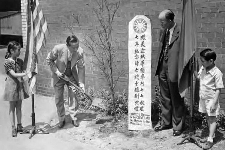 On Leong Merchants Association president planting a tree in 1944.