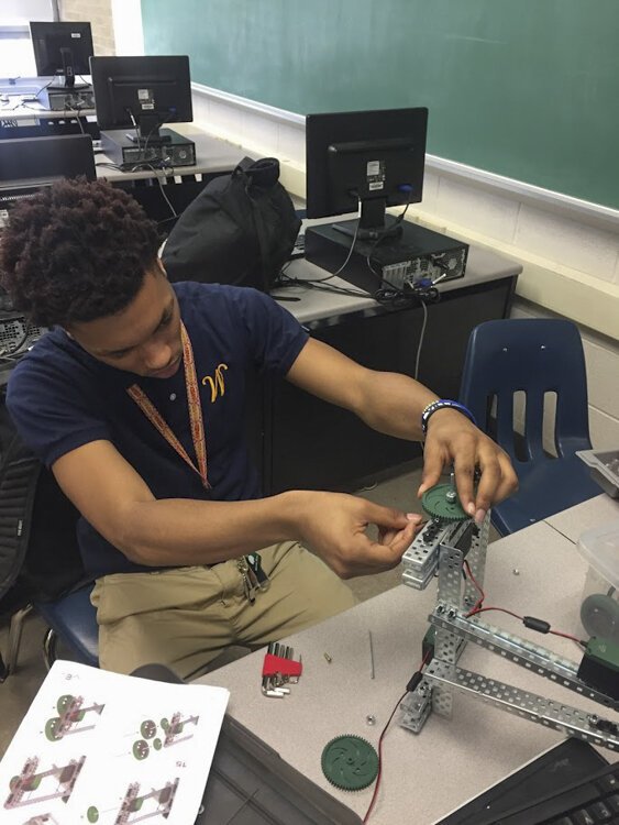 A Warrensville Heights High School scholar explores robotics and engineering.