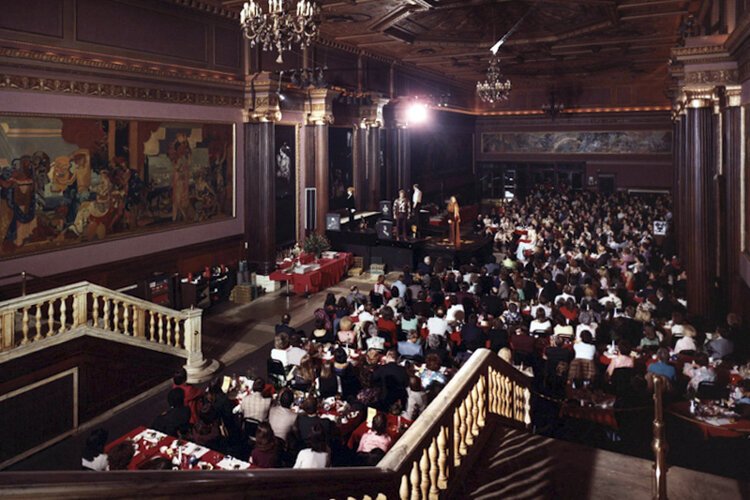 "Jacques Brel is Alive and Well and Living in Paris" is shown being performed in the Lobby of the State Theater in 1973.