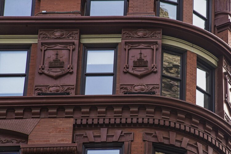 The Soldiers and Sailors Monument: Depicted on the side of the Schofield building is another design of Levi T. Schofield: