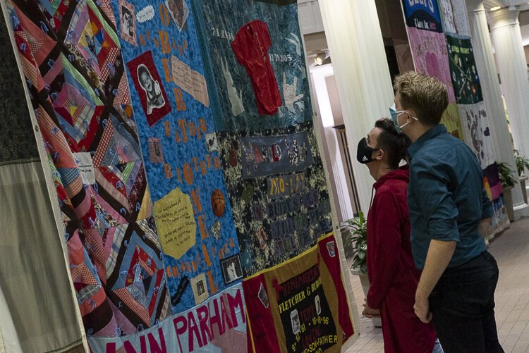 CONVERGE display of sections of the National AIDS Quilt which memorialize midwestern lives lost to the disease at the MetroHealth Reception.