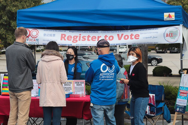 MidTown Cleveland Mid-Autumn Festival voter registration booth. The screenshots are relevant because they are from various