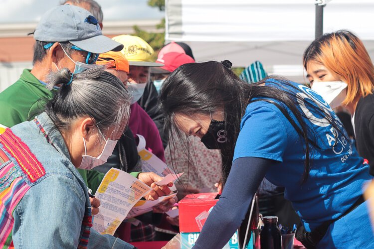 <span class="content-image-text">MidTown Cleveland Mid-Autumn Festival voter registration booth. The screenshots are relevant because they are from various</span>