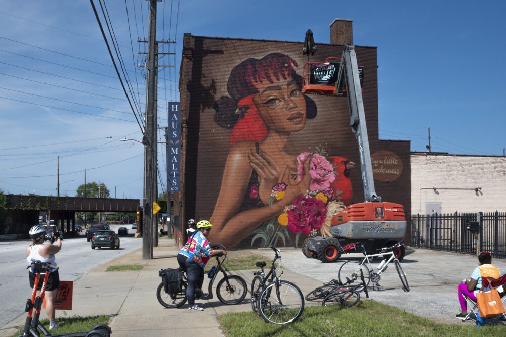 Mural by artist Tatiana Suarez @tatunga from Miami, FL at 6107 Carnegie Avenue