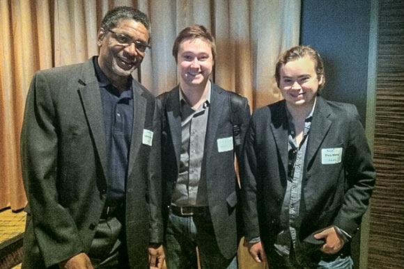 Johnny Hutton, COO of CFRC Water and Energy Solutions (left) poses with Everykey CEO Chris Wentz (right) and Wentz's guest.