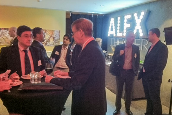 ProtoTech: Invest attendees mingle around the Alex Theater in the Metropolitan at the 9