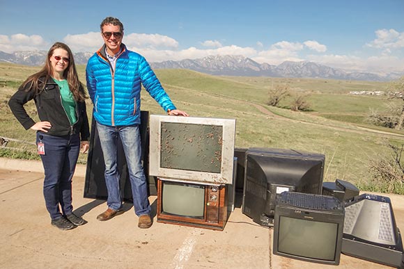 Two KeyBank employees during  e-waste recycling day at Key's Superior, Colorado facility