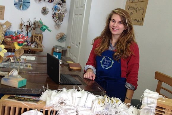 Maggie Halm tends things at Collective Upcycle