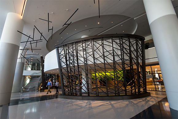 The free-standing powder coated steel wall by public artist Steve Manka in the Hilton lobby