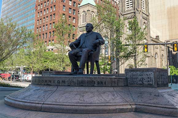 The refurbished statue of 1901 mayor Tom Johnson now sits on the north center section of the square