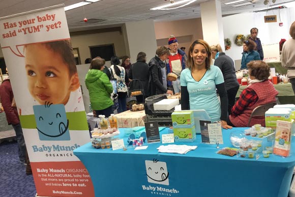 is Le’Anna Miller, owner of Baby Munch, at the North Union Farmers Market at Shaker Square