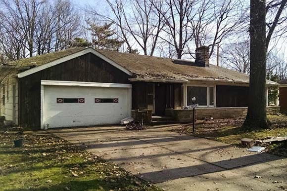 16237 Forest Hills Blvd exterior before