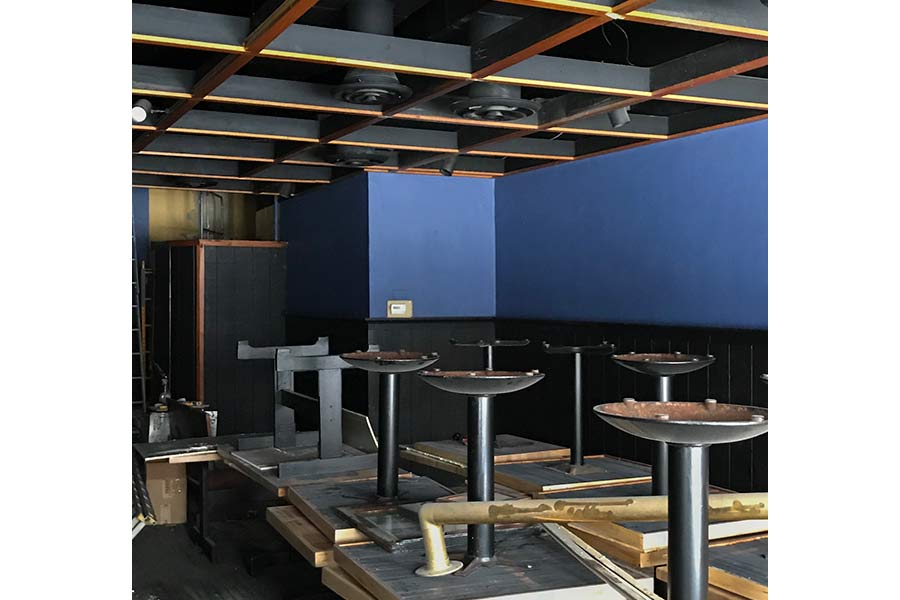 Second dining room with the refurbished tables